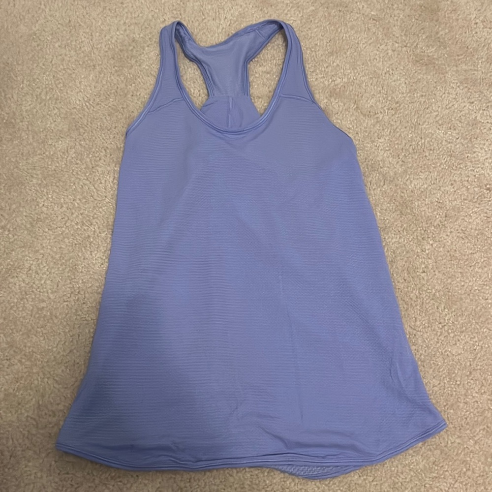 Worn once lululemon tank. Beautiful periwinkle color. Looks and feels like new